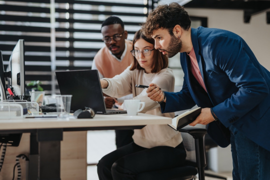 Product developers discuss strategic planning and business development.