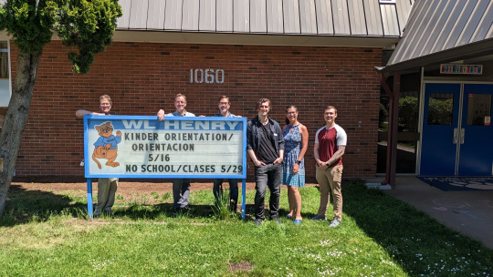 Clarity Team L-R: Tim Rayle, Jonathan Maier, Greg Watson, Dei Biddy, Kelly de Vries, and intern Bodie Wood outside WL Henry Elementary School