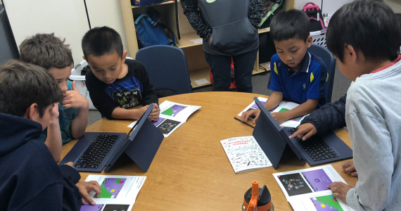 A blend between technology and tactile materials brings kids together in the classroom.