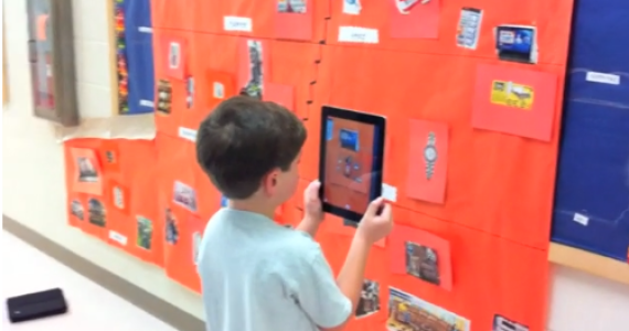 Young student using an augmented reality app
