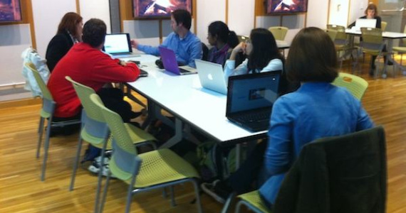 Get CC Savvy Workshop Students Watching and Discussing a Video