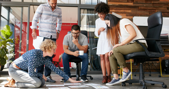 Creative professionals working together on a design