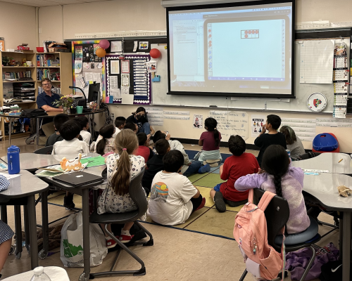 Clarity engineer Tim Rayle presents math apps to WL Henry School students