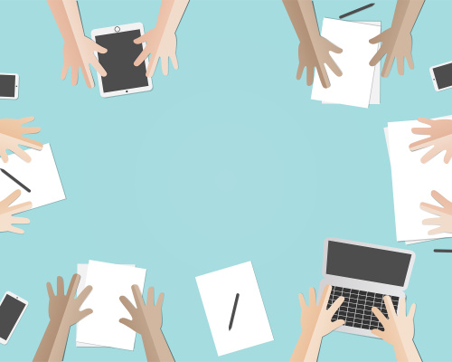  Establishing Consensus in the Classroom hands with devices and papers sitting together at a table