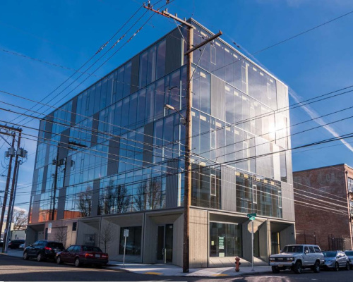 Photograph of our new building taken from across the street. 