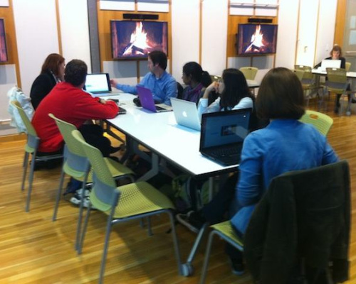 Get CC Savvy Workshop Students Watching and Discussing a Video