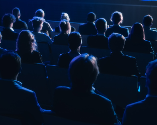 People looking at a stage.